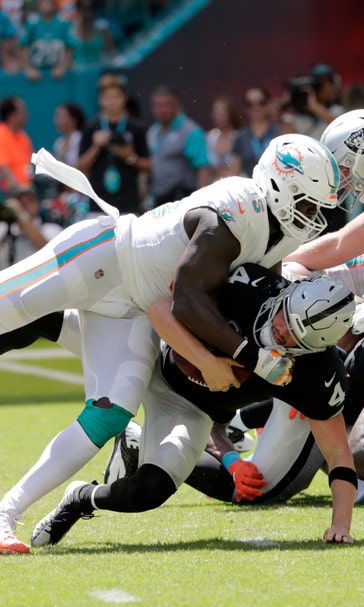 Dolphins DE Hayes to miss rest of season with torn ACL
